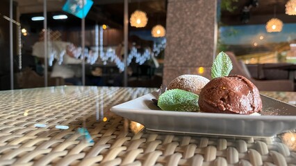 chocolate ice cream with flaskme mint in the restaurant