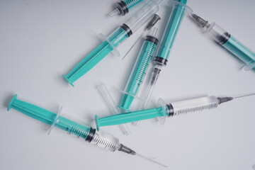 Fototapeta premium medical disposable injection syringe on a white background