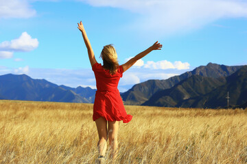 mountains travel field girl, freedom and happiness concept active