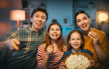 Mother, father and daughters spending time together.
