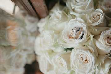 Wedding shoes, ring, bouqet and accessories stock photo.