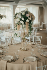 Decoration with fresh flowers, candles, light bulbs, garlands. Vintage style. Table setting for an event party or wedding reception. Event decorations.