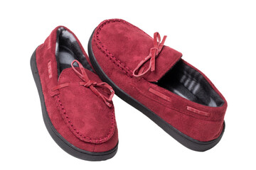 Slippers isolated. Close-up of a pair of female red warm and soft cosy terry house slippers isolated on white background.  Womans shoes. Macro.