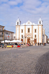 Fototapeta na wymiar EVORA, PORTUGAL - february 26, 2022 : Giraldo square in Evora. Positioned on the square fountain and the church of St. Anton, relating to the XVI century.