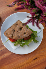 Toasted sandwich filled with beef and vegetables 