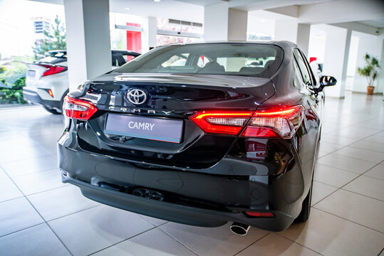 Uzhhorod. Ukraine September 15, 2021. brand new black  Toyota Camry car in the showroom..