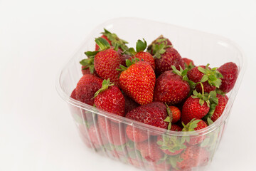 strawberries in bowl on white background