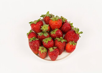 strawberries in bowl on white background