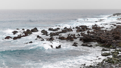Background with rocky atlantic ocean coast of the Tenerife, Canary islands, Spain