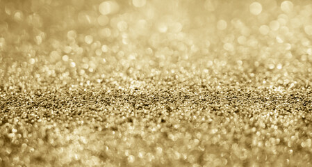 Abstract gold glitter sparkle with bokeh background