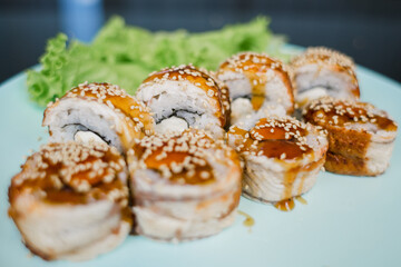 Obraz na płótnie Canvas Japanese roll with eel and cream cheese and rice
