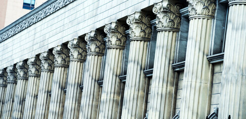 Close-up of Greek-style columns in a line
