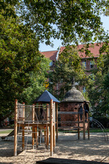 Fototapeta na wymiar Old wooden playground in the park 