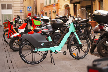 Fototapeta na wymiar Bicycles parked at a bike sharing station