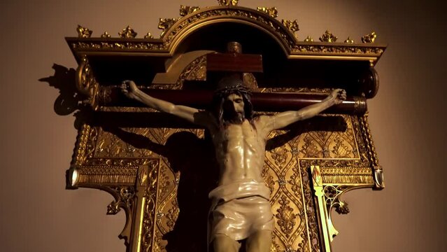 Monastery of Montserrat. Basilica of the Virgin Mary of Montserrat. Shrine of Catalonia statue of the Black Madonna. Altar part. Church sculptures and the crucifixion of the cross of Jesus