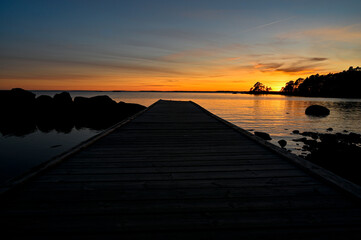 Naklejka na ściany i meble Beautiful sunset over lake Vattern near Motala