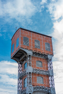 One of the two revitalized towers of the former hard coal mine in Świętochłowice. Towers of KWK Poland. Brick facade and steel support structure.