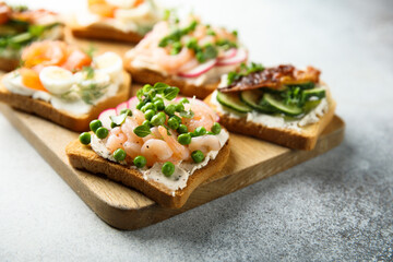 Shrimp toast with cream cheese, radish and green pea
