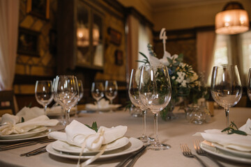 Empty glasses set in restaurant. Part of interior