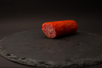Sausage cut into pieces on a plate