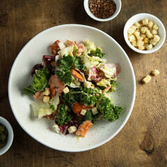 Kale salad with hot smoked salmon