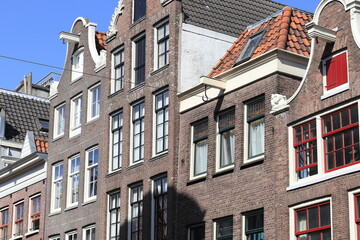 Fototapeta na wymiar Amsterdam Haarlemmerstraat Historic Brick House Facades Close Up, Netherlands