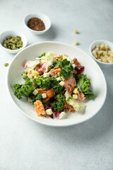 Kale salad with hot smoked salmon