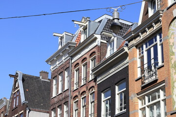 Fototapeta na wymiar Amsterdam Haarlemmerstraat Street Traditional Brick House Facades Close Up, Netherlands