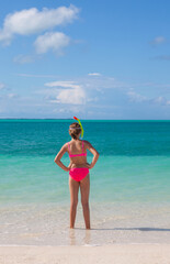 Caucasian young female bright bikini with snorkel mask