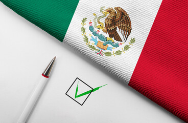 Pencil, Flag of Mexico and check mark on paper sheet