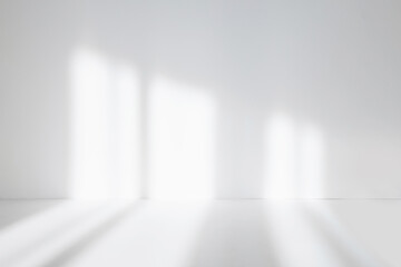 Abstract white studio background for product presentation. Empty room with shadows of window. Display product with blurred backdrop. Soft focus