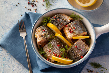 Fried seafood rich in protein with lemon and spices. Fish of the northern seas. Healthy seafood rich in protein and omega.