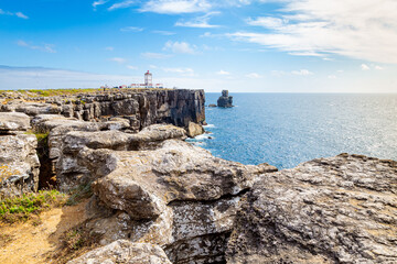 Cliffs and lighthouse of Carvoeiro cape in Peniche - obrazy, fototapety, plakaty