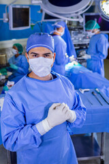 Portrait male doctor in sterile face mask gloves