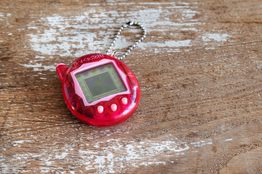 Tamagotchi pink game virtual pet close up