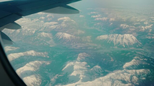 Aircraft cruising over the beautiful Alps of Austria