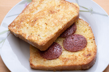 hot sandwich bread and sausage for breakfast