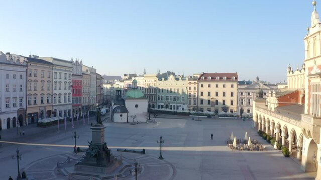 Krak&oacute;w Cloth Hall (Sukiennice) and  Adam Mickiewicz Monument in main square in Lesser Poland. city's most recognizable icons. It is the central feature of the main market square in the Krak&oacute;w Old 
