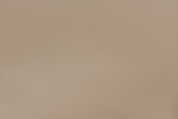 Khaki textured smooth leather surface background, small grain