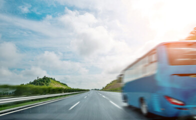Fototapeta na wymiar Blue bus on asphalt road