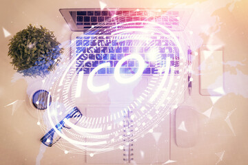 Blockchain theme hologram drawings over computer on the desktop background. Top view. Multi...