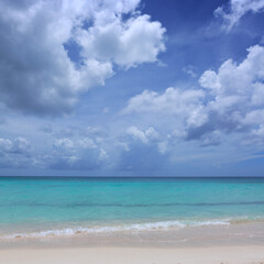 Fototapeta na wymiar Travel background with clouds sky and Caribbean sea.