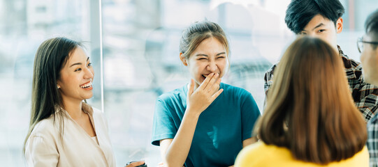 Group of asian young creative happy enjoy laugh smile and great success emotion teamwork people business startup entrepreneur casual brainstorm business meeting office background
