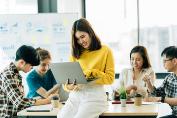Asian Business People Analyzing Statistics Financial Concept.