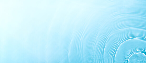 Transparent blue clear water surface texture with ripples, splashes and bubbles. Abstract summer...