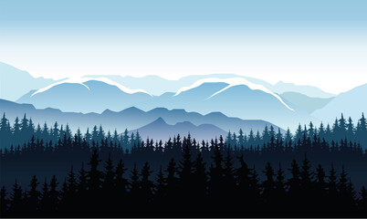 Obraz premium snowy mountains with forest silhouettes and cold misty weather