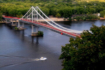 Park pedestrian bridge over the Dnieper River in the capital of Ukraine - Kyiv