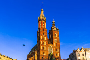 St. Mary's Basilica at sunset on the main market square in Krakow, Poland