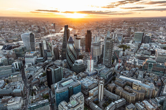 Aerial London sunset financial district city skyscrapers UK