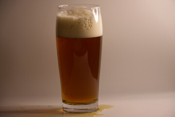 Glass of beer with foam